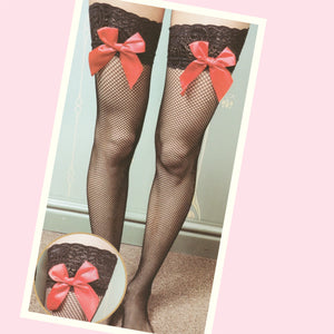 Black fishnets with red bows